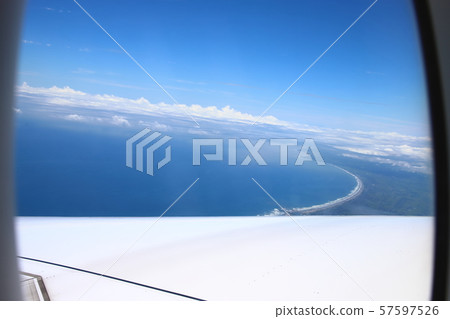 Above the clouds (from the plane) Above the clouds (from the plane) 57597526