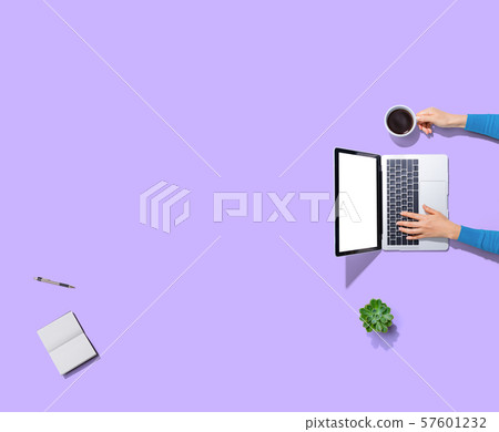 Person using a laptop computer Person using a laptop computer 57601232