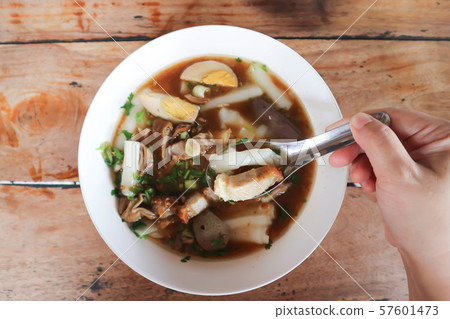 eating noodle, Chinese noodle or pork noodle 57601473