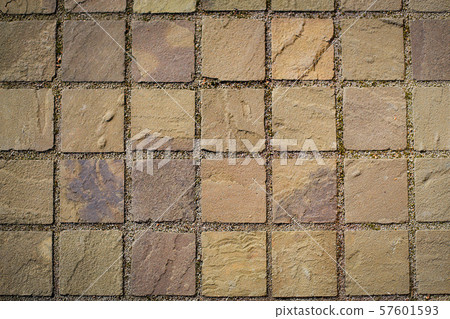 The road is paved with paving stone tiles .Texture.Background. 57601593
