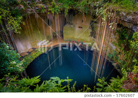 Cenote Ecoturistico Ik-Kil with blue clear water 57602607