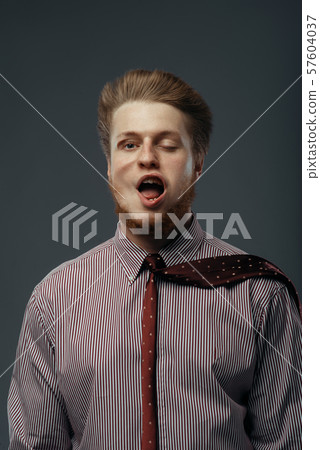 Strong wind blowing in male face, funny emotion Strong wind blowing in male face, funny emotion 57604037