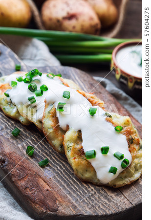 Potato pancakes with dill 57604278