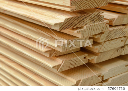 End view of stacked lumber. 57604730
