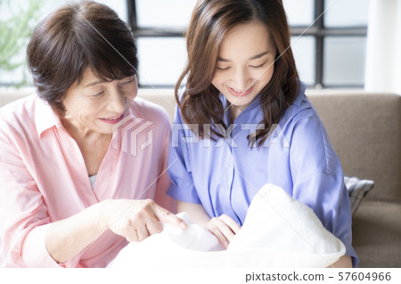 Family Parent and child Baby Homecoming Grandparents Grandchild Infant Newborn Mother Mom Family First Grandchild 57604966