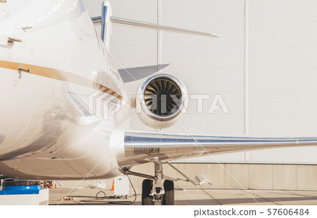 modern and comfortable business jet plane in the afternoon at the airport 57606484