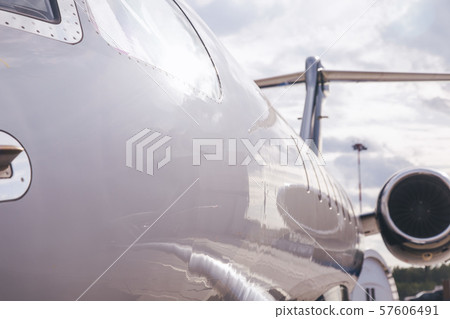 modern and comfortable business jet plane in the afternoon at the airport 57606491