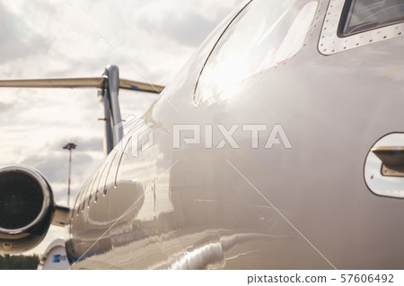 modern and comfortable business jet plane in the afternoon at the airport 57606492