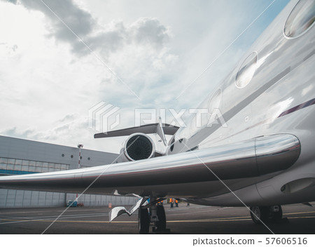 modern and comfortable business jet plane in the afternoon at the airport 57606516