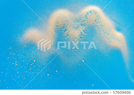 Acrylic Fluid Art. Golden wave on blue background. 57609806