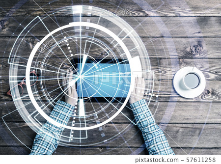 Business workplace with tablet device coffee cup and media interface Business workplace with tablet device coffee cup and media interface 57611258