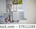 Business woman Dragging suitcase luggage 57611288
