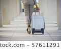 Business woman Dragging suitcase luggage 57611291