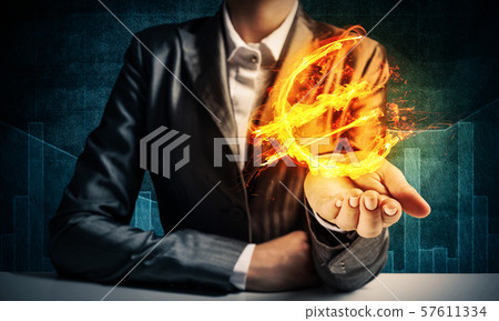 Businessman presenting euro symbol. Businessman presenting euro symbol. 57611334