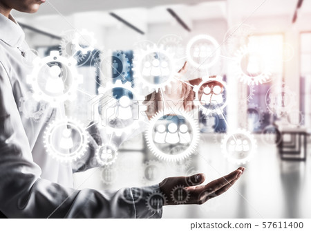 Cogwheels and gears mechanism as social communication concept Cogwheels and gears mechanism as social communication concept 57611400