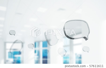 Concept of communication by glass empty chat icon on office background. Mixed media 57611611
