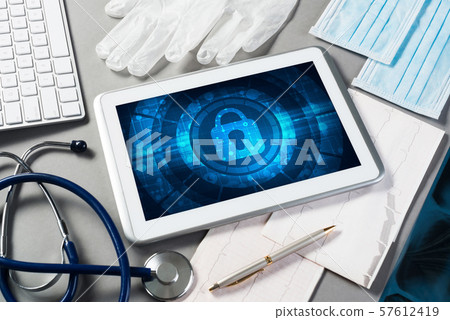 Web security and technology concept with tablet pc on table Web security and technology concept with tablet pc on table 57612419