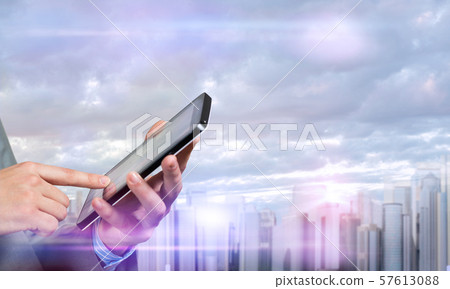 Businessman using tablet 57613088