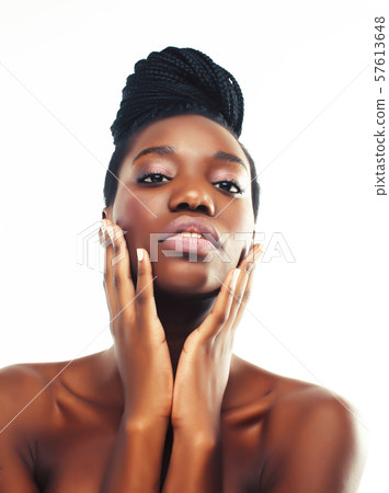 young pretty african american woman with natural makeup taking care of her skin isolated on white young pretty african american woman with natural makeup taking care of her skin isolated on white 57613648