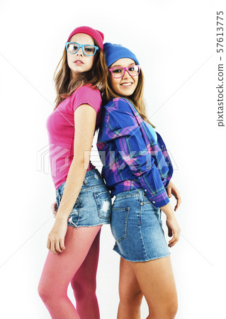 two best friends teenage girls together having fun, posing emotional on white background, besties 57613775
