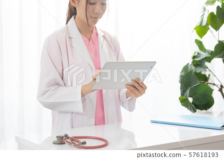 Medical image white cloth female doctor 57618193