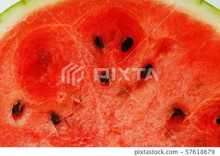 Half slices of tasty and ripe red watermelon on a Half slices of tasty and ripe red watermelon on a 57618679