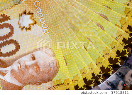 Canadian hundred dollars background Canadian hundred dollars background 57618811