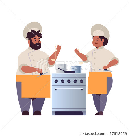 cooks couple professional chefs preparing and tasting dishes african american woman man restaurant cooks couple professional chefs preparing and tasting dishes african american woman man restaurant 57618959