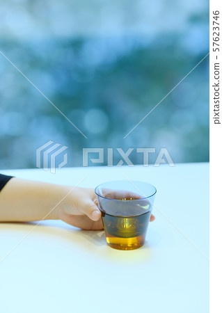 Women's hand with glasses Women's hand with glasses 57623746