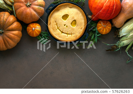 Halloween party home baked pumpkin pie background Halloween party home baked pumpkin pie background 57626263