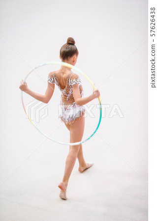 Little gymnast training on the carpet and ready for competitions 57626438
