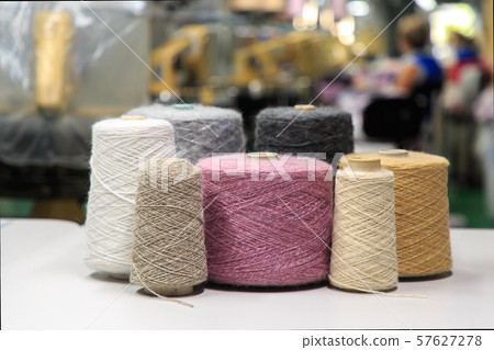 Multicolored bobbins of wool yarn 57627278