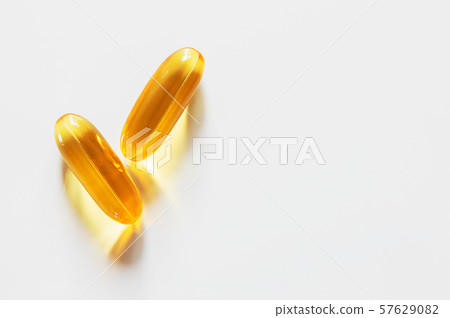 Supplement omega 3 fish oil capsules on white background Supplement omega 3 fish oil capsules on white background 57629082