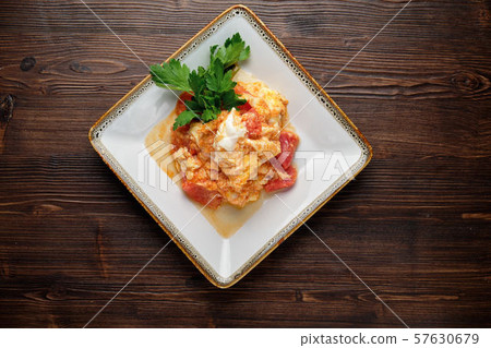 Omelet with tomatoes and herbs . menu for catering 57630679