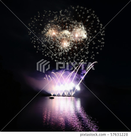 International competition of fireworks over the water. 57631228