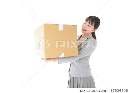Young business woman carrying luggage Young business woman carrying luggage 57634896