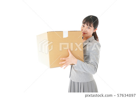 Young business woman carrying luggage Young business woman carrying luggage 57634897