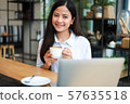 Asian woman in cafe 57635518