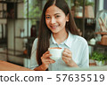 Asian woman in cafe 57635519