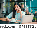 Asian woman in cafe 57635521