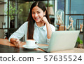 Asian woman in cafe 57635524