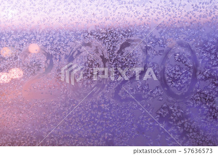 Winter texture of new year 2020. Color texture on glass from cold air from frost. 57636573