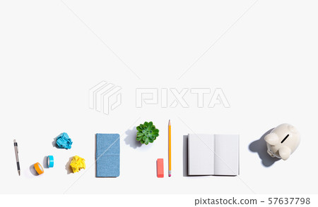 Piggy bank with office supplies 57637798