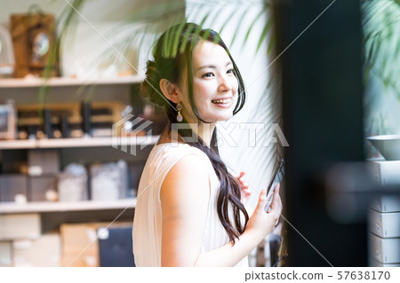 Young woman, shopping, smartphone Young woman, shopping, smartphone 57638170