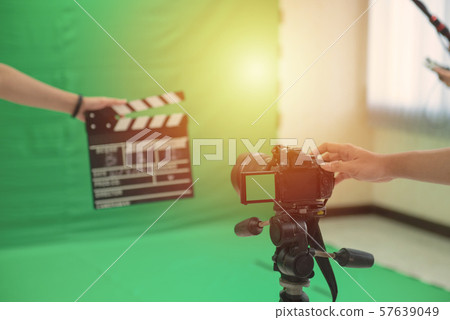 Hands hold black Clapperboard or movie slate. Hands hold black Clapperboard or movie slate. 57639049