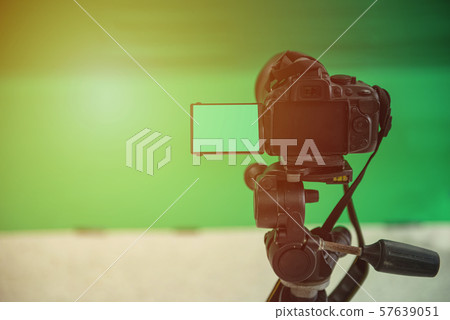 Videographer taking video camera, camera equipment 57639051