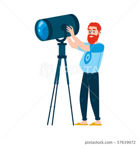 A red haired bearded caucasian man controls lighting equipment. A red haired bearded caucasian man controls lighting equipment. 57639072