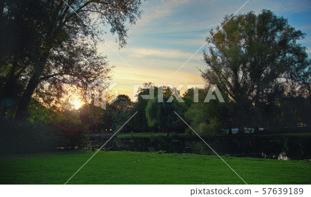 Beautiful sunset in the Rheinaue park next to a Beautiful sunset in the Rheinaue park next to a 57639189