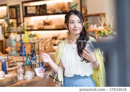 Young woman, shopping, smartphone, looking 57639636
