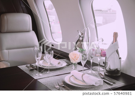 modern and comfortable interior of business jet aircraft with decor modern and comfortable interior of business jet aircraft with decor 57640981